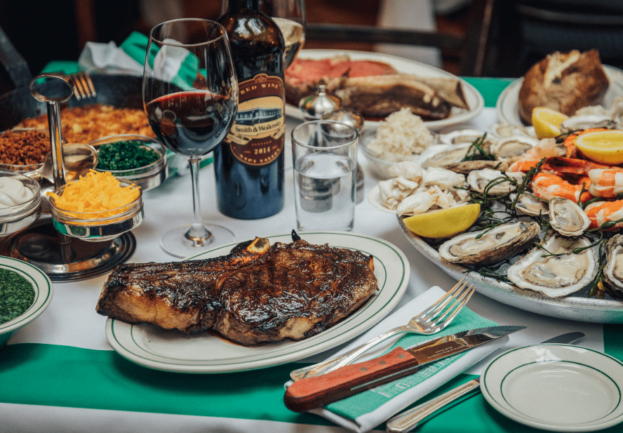 Table full of food at Smith & Wollensky