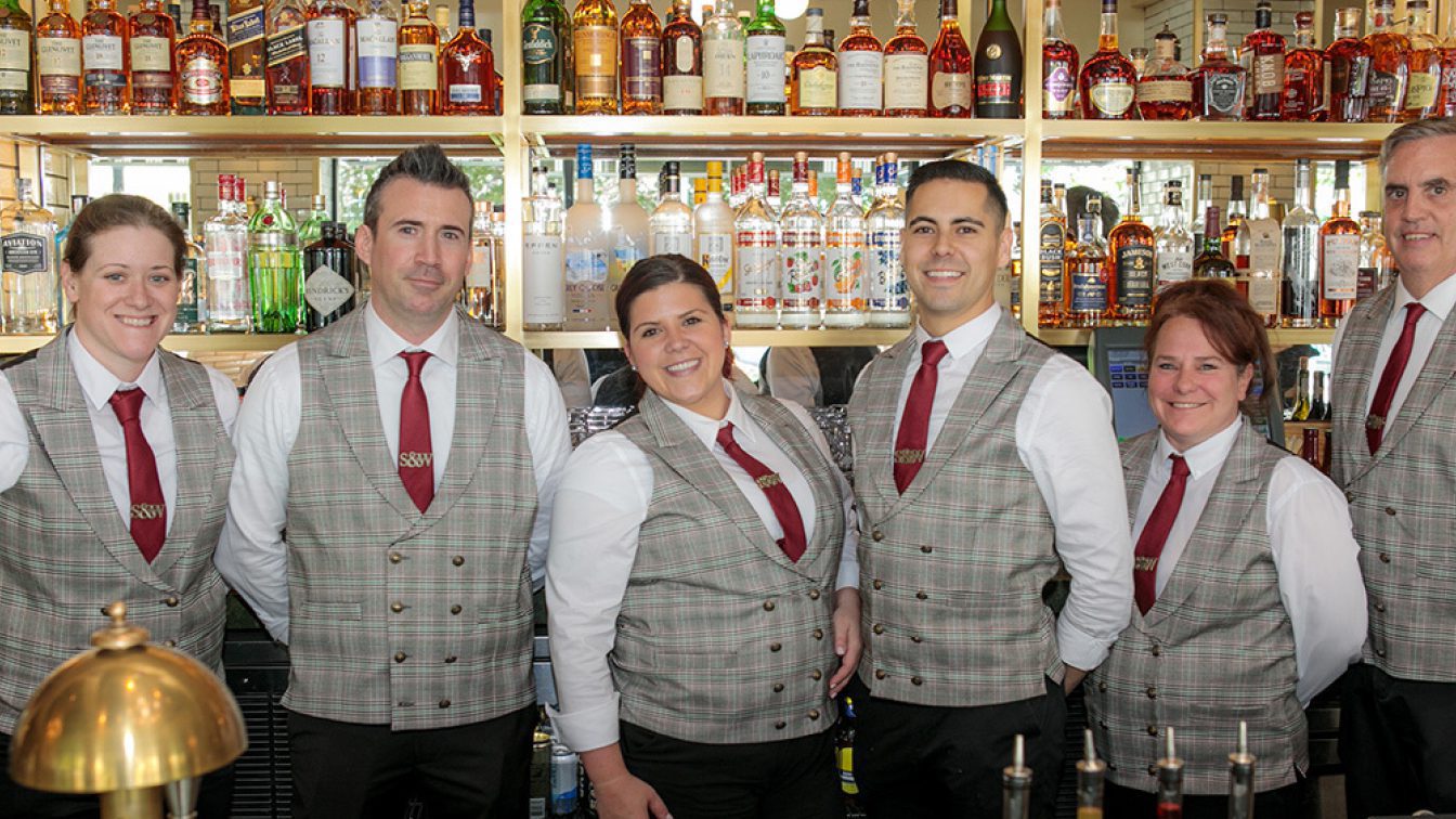 Smith & Wollensky staff standing in the bar