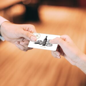 Hands holding a S&W Gift Card
