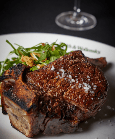 Steak with side salad