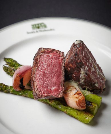 Steak with onion and asparagus