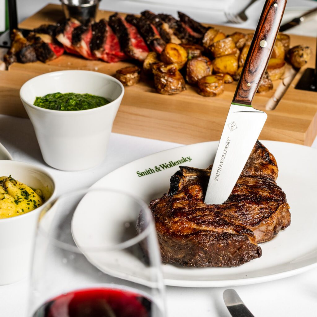 Steak served with a knife and side dishes